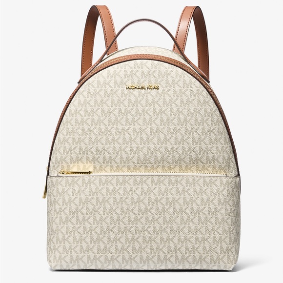 Michael Kors Handbags - NWT in box
Michael Kors Signature Cream and Brown Backpack